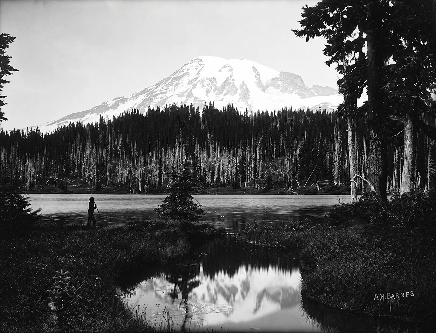 Vintage photograph of Mount Rainier reflected in a lake